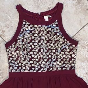 Maroon dress with flowers on top